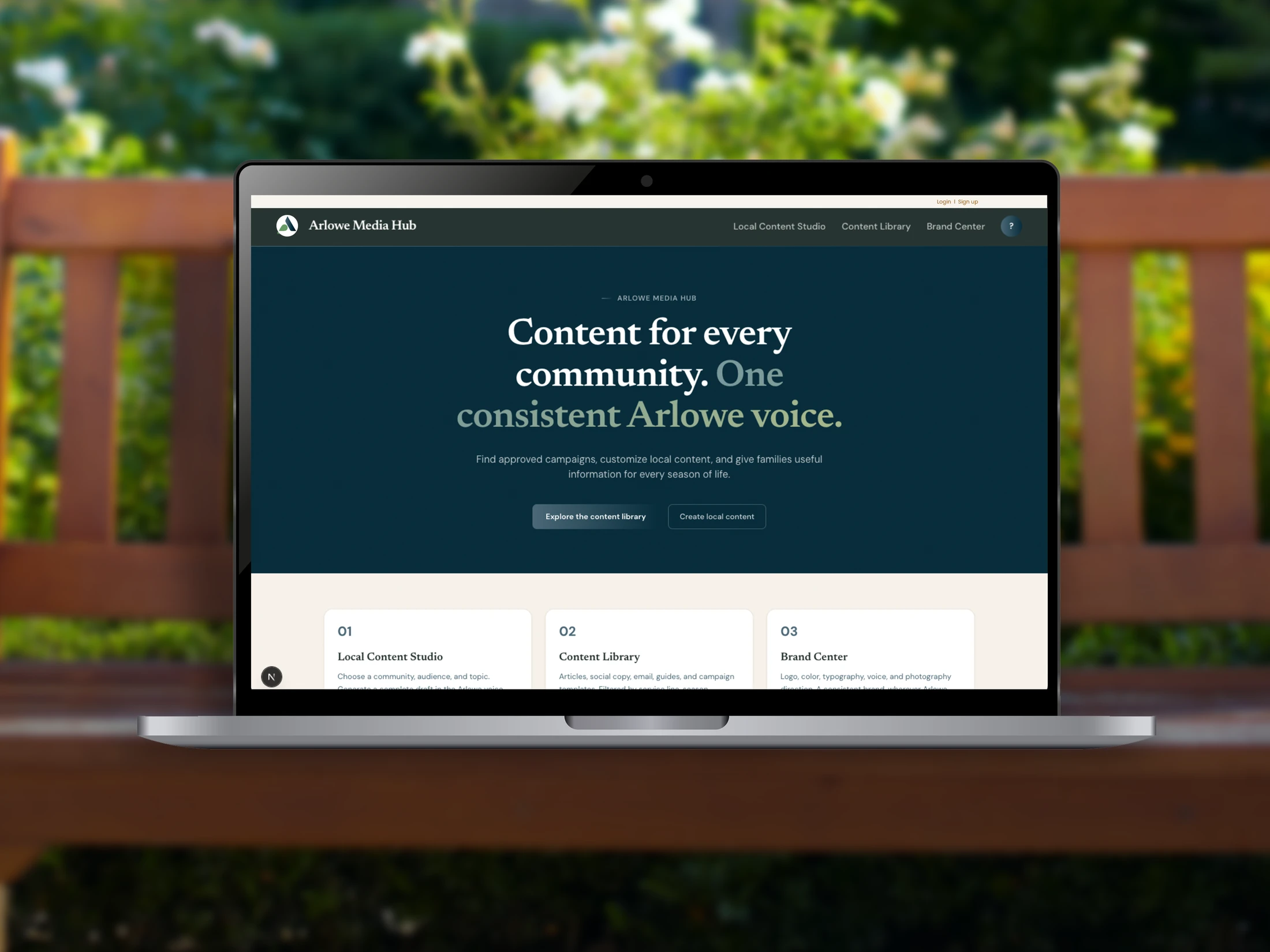 Arlowe Media Hub homepage displayed on a laptop outdoors, headline Content for every community, one consistent Arlowe voice.