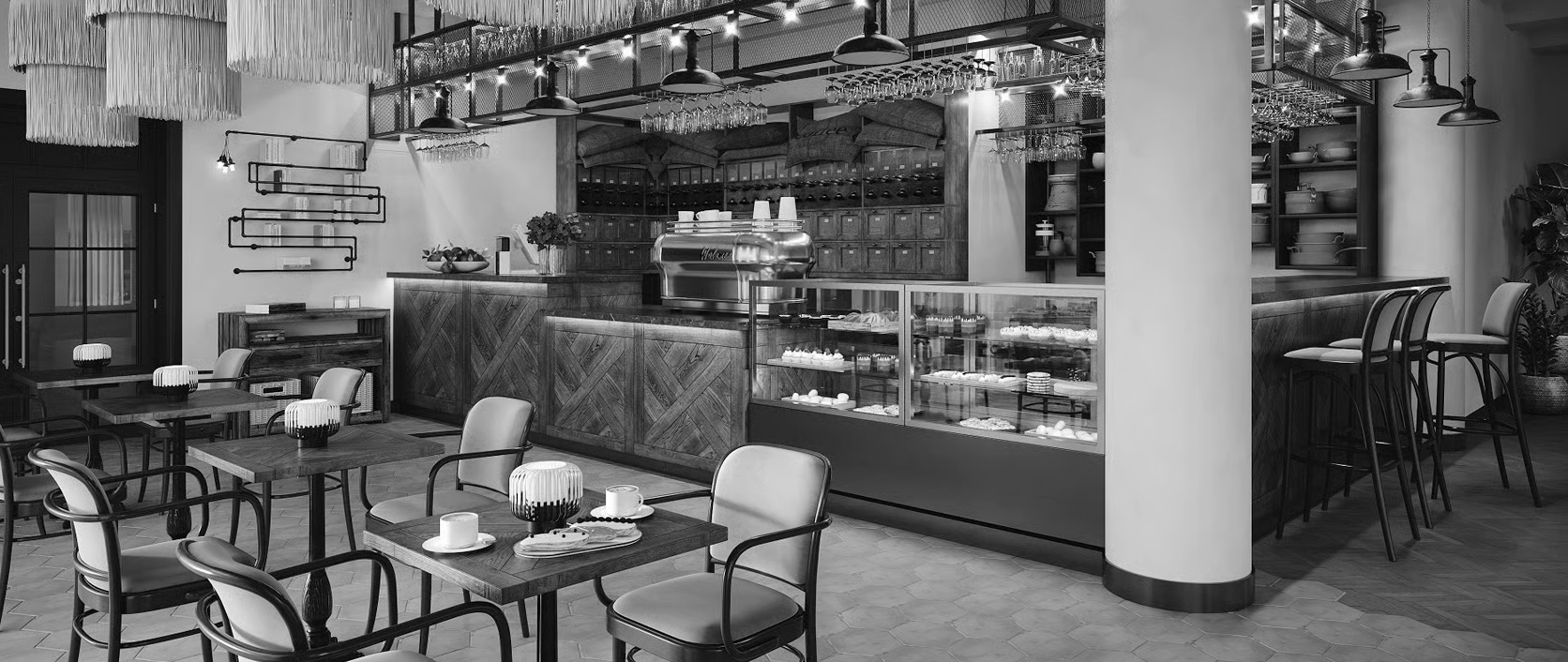 A server or owner welcoming diners at a real restaurant with warm lighting